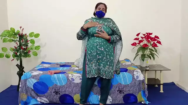 Witness the Ecstasy of a Desi Aunty's Orgasm with a Dildo