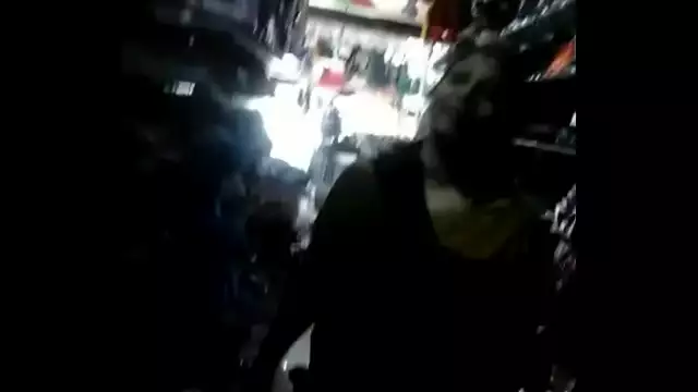 Indian Aunty showing off body in shop part 2