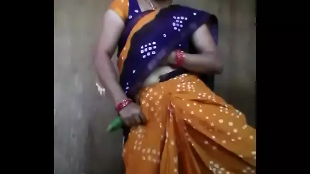 Indian lady is using cucumber inside her vagina pussy